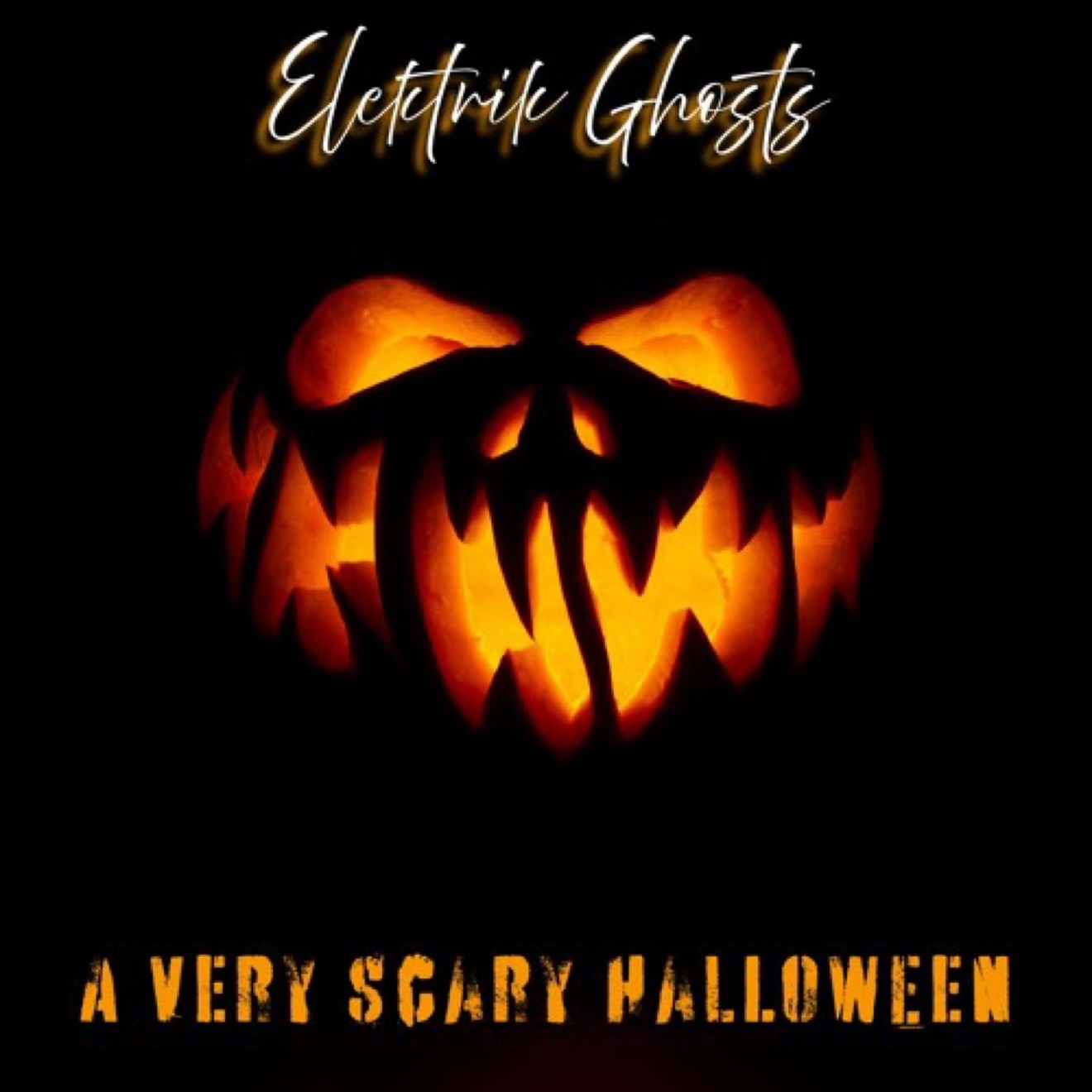 Elektrik Ghosts — A Very Scary Halloween: a glowing jack-o'-lantern face in the dark